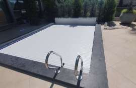 Укрыть бассейн: защитные покрытия для долгосрочной эксплуатации и безопасности